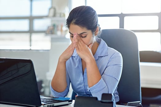 Woman stressed at computer- JConnelly blog- make sure your message is heard