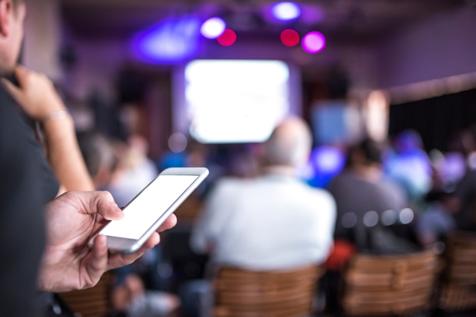 Person on cellphone- JConnelly blog- 3 tips to get the most out of social at your event
