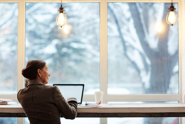 Woman at Laptop by Window- JConnelly Blog- 7 Tips to Write a Better Blog